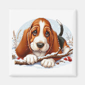 Basset Hound Puppy in een besneeuwde winterscène Magneet (Voorkant)