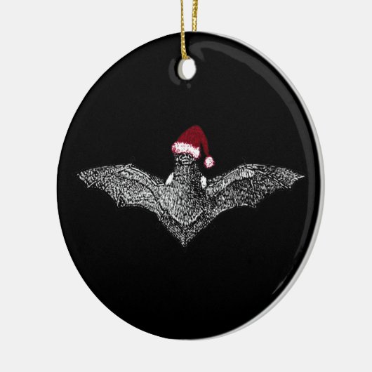 Bat in een kersthat keramisch ornament (Links)