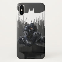 Batman Perched op een pilaar
