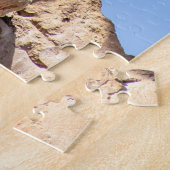 Baviaan aap boven op een berg legpuzzel (Zijkant)