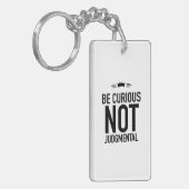 Be curious black sleutelhanger (Voorkant Links)
