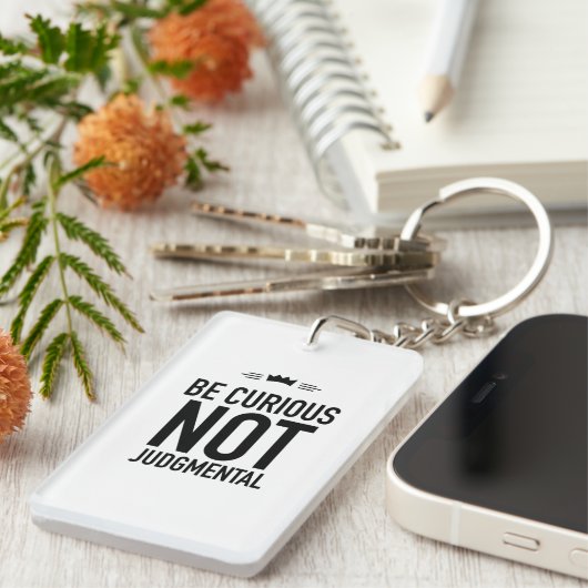 Be curious black sleutelhanger (Voorkant Rechts)