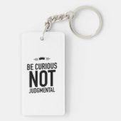 Be curious black sleutelhanger (achterkant)
