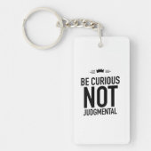Be curious black sleutelhanger (Voorkant)