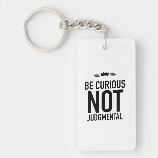 Be curious black sleutelhanger (Voorkant)