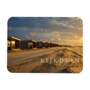 Beach cabins at sunset at the dutch coast magneet