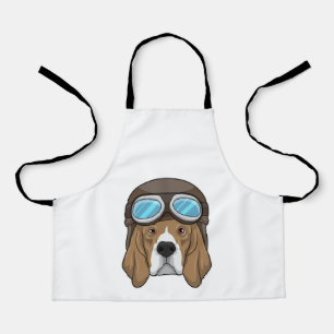 Beagle als piloot met piloot-pet schort