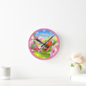 Beautiful Ladybug in the flower garden. Ronde Klok (Huis)