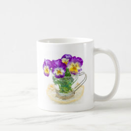 beautiful pansy flowers isolated in a cup koffiemok