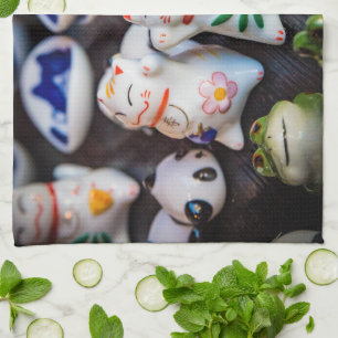 Beckoning cat figines theedoek