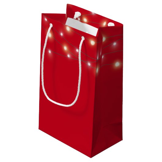 Bedankt in berijpte tekst met lichte tekenreeks klein cadeauzakje (Achterkant Gekanteld)