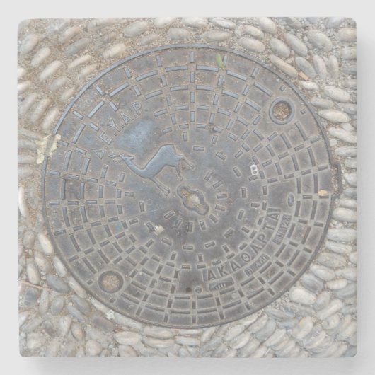 Bedekking van mangat en steenhouwerend onderzetter (Voorkant)