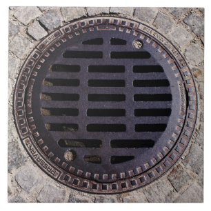 Bedekking van mangat en steenslag, van keramische  tegeltje