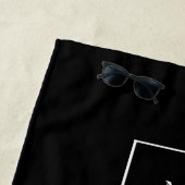 Bedrijf dat zwart-wittekstzaken logo strandlaken (In situ)