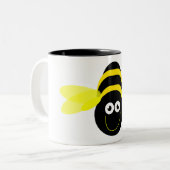Bee Happy cartoon op een witte mok zwarte binnenka (Voorkant links)