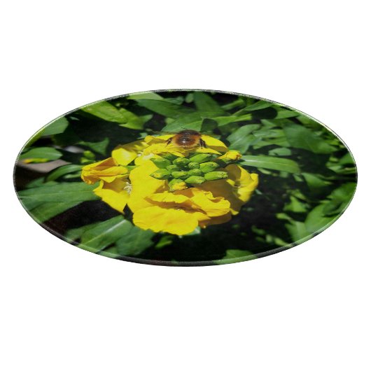 Bee op gele bloemen snijplank (Hoek)