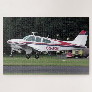 Beechcraft Bonanza OO-JKM – Kemble Vliegveld Legpuzzel