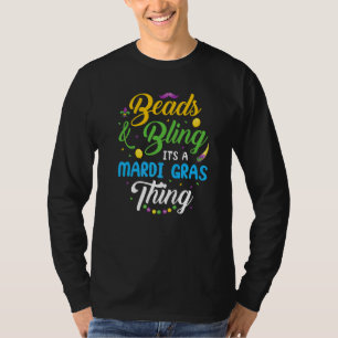 Beeldjes en bling Het is een Mardi Gras-ding T-shirt