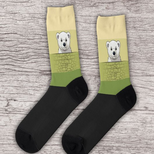 Beer kijkt over de muur, boom in de woestijn sokken