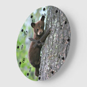 Beer klimmen een boom grote klok (Hoek)