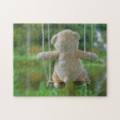 Beer op schommel vanaf de rug. legpuzzel (Horizontaal)