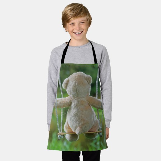 Beer op schommel vanaf de rug. schort (Gedragen)