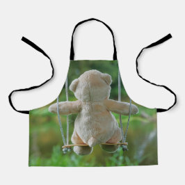 Beer op schommel vanaf de rug. schort