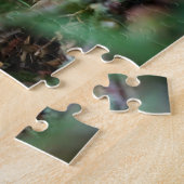 Beertje dat bij kampvuur zit. legpuzzel (Zijkant)