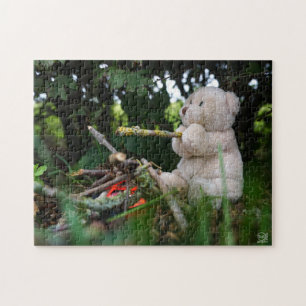 Beertje dat bij kampvuur zit. legpuzzel