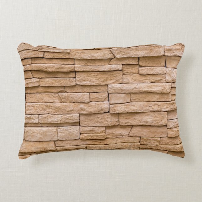 Beige bakstenen muur: close-up textuur. accent kussen (Voorkant)