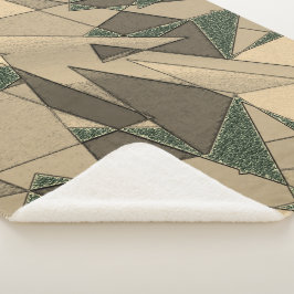 Beige driehoekige snede op de donkergroene achterg sherpa deken