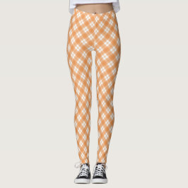 Beige en witte geruite leggings getoond 