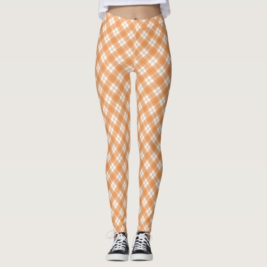 Beige en witte geruite leggings getoond  (Voorkant)