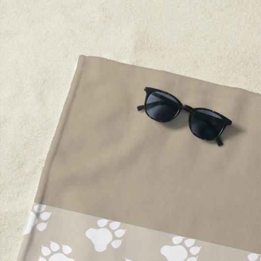 beige en witte reuen en bonen met naam strandlaken (In situ)