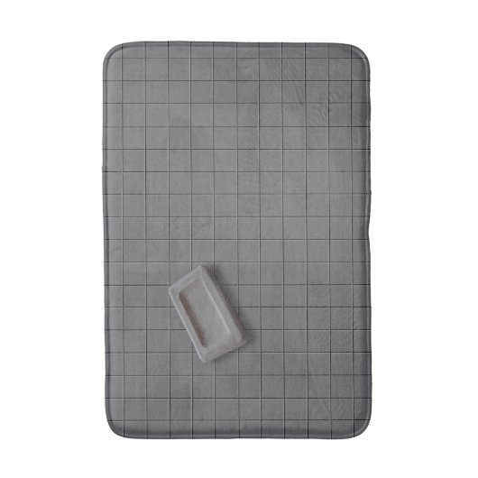 Beige grijze balkzeep op een grijze teelvloer badmat (Voorkant Verticaal)