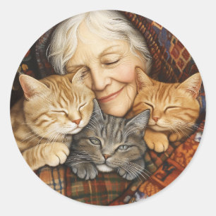 Bejaarde vrouw omhelst drie gezellige katten ronde sticker