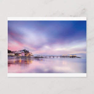 Bekende Cromer pier in Norfolk England met roze su Briefkaart