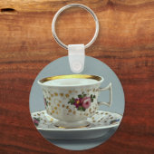 Beker en saucer met kleurrijke design erop. sleutelhanger (Voorkant)