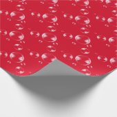 bellen op rode achtergrond cadeaupapier (Hoek)