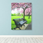 Bench en kersenbloesem uitzicht canvas print (Insitu (Houten vloer))