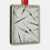 Bepaling van de hoeveelheid spuiten in verschillen metalen ornament (Rechts)