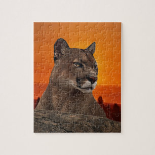 Berg leeuw op zonsondergang legpuzzel