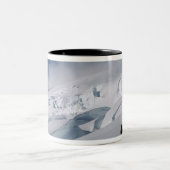 Bergbeklimmer op de Tasman-gletsjer op de berg Tweekleurige Koffiemok (Center)