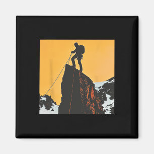 Bergbeklimmer op een top silhouet magneet