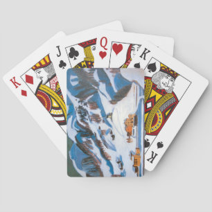 Bergen en huizen in het sneeuwlandschap pokerkaarten