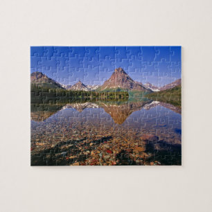 Bergen weerspiegelen zich in het rustige Two Medic Legpuzzel