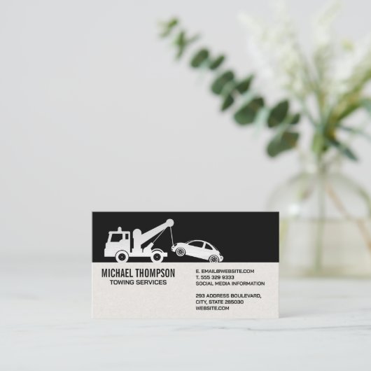 Bergingsvoertuig trekt auto visitekaartje (Staand voorkant)