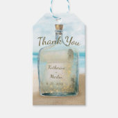 Bericht in een gevechtsband met een flesje cadeaulabel (Voorkant)