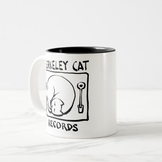 Berkeley Cat Logo merch Tweekleurige Koffiemok (Voorkant links)
