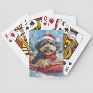 Bernedoodle-hond in slee laat het sneeuwen Kerstmi Pokerkaarten